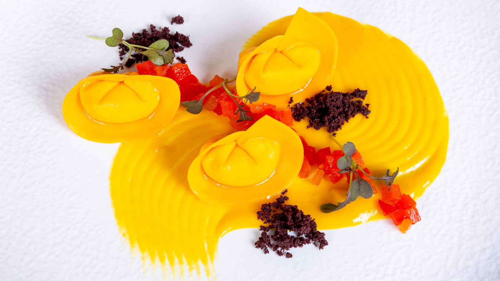 Arnolfo - Tortelli fresh pasta, Sheep ricotta, Sweet peppers, Olive Tortelli fresh pasta, Sheep ricotta, Sweet peppers, Olive